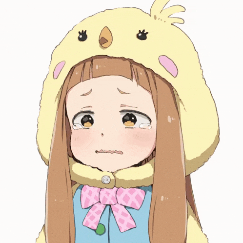 a girl wearing a yellow hat with a bird face on it