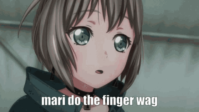 a picture of a girl with the words mari do the finger wag on the bottom