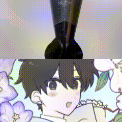 a close up of a brush and a drawing of a boy with flowers