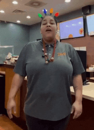 a woman wearing a t-shirt that says ' 7 eleven ' on it