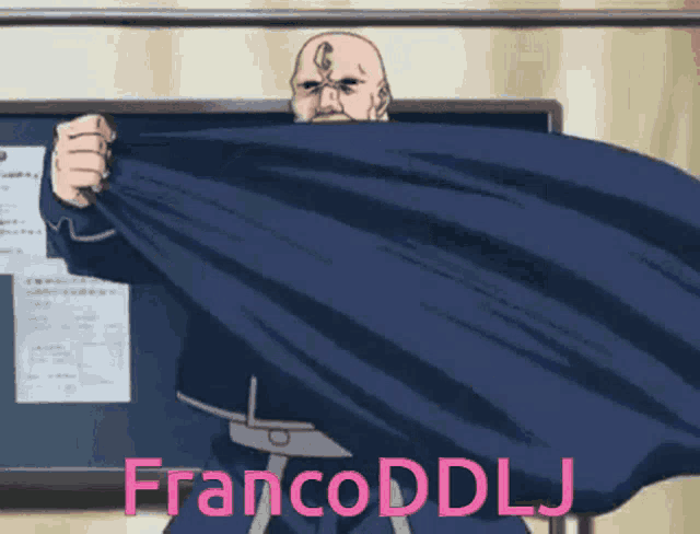 a bald man is holding a blue cloth with francoddllj written in pink