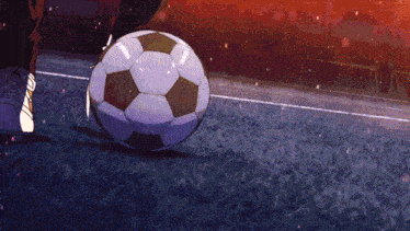a soccer ball is being kicked by a person on a field