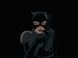 a cartoon of a woman in a catwoman costume with her eyes closed and red lips .
