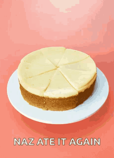 a white plate with a cheesecake on it and the words naz ate it again below it