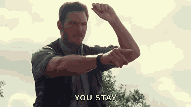 a man wearing a smart watch says you stay