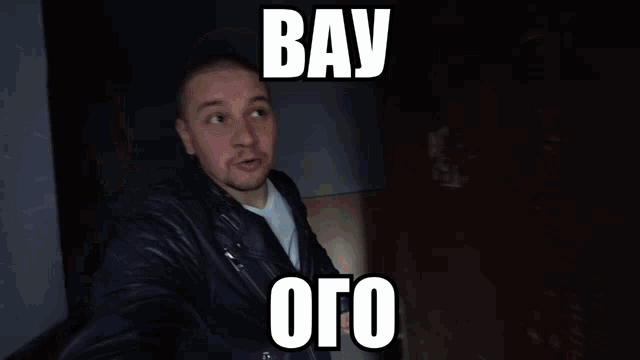 a man in a leather jacket with the words bay oto on his face