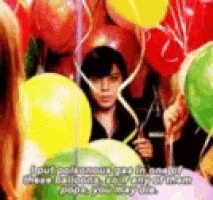 a girl holding a bunch of balloons with a caption that says " tout poisonous gas in an major cheese balloon "