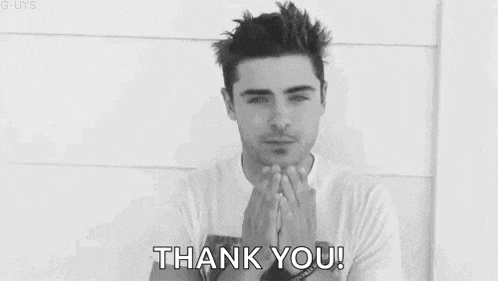 a black and white photo of a man saying `` thank you '' .