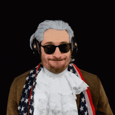 a man wearing a wig and sunglasses is wearing an american flag scarf