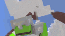 a minecraft character with a green head and green arms is standing in the air holding a stick .