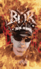 a blurry picture of a man wearing a papa jenkins hat