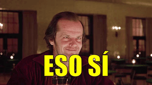 a man in a red jacket says " eso si " in yellow