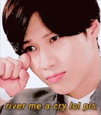 a close up of a man 's face with the words river me a cry lol pls below him