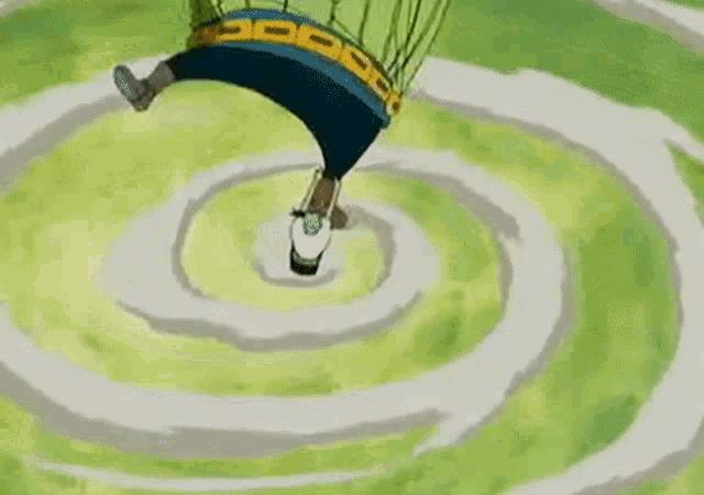 a man in a green shirt is standing in a swirl of green grass .