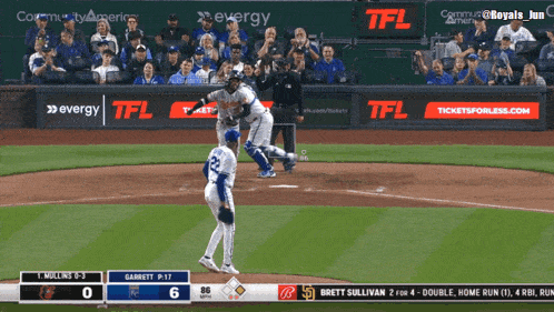 a baseball game between the royals and the dodgers is being shown on a screen