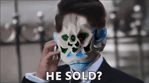 a man talking on a cell phone with a skull mask on his face and the words he sold