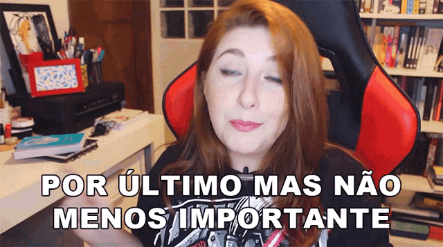 a woman sitting in a red chair with the words por ultimo mas nao menos importante above her