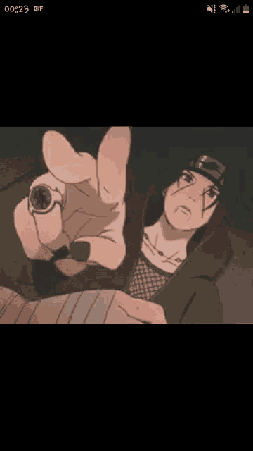 itachi uchiha from naruto is pointing at the camera with his hand .