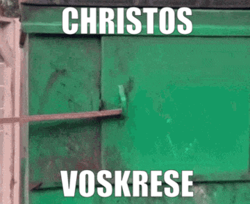 a raccoon is sticking its head out of a green door with the words christos voskrese written on it