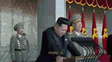 a man stands at a podium with the words point is written on it
