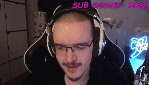 a man wearing headphones and glasses with the words sub count 1888 behind him