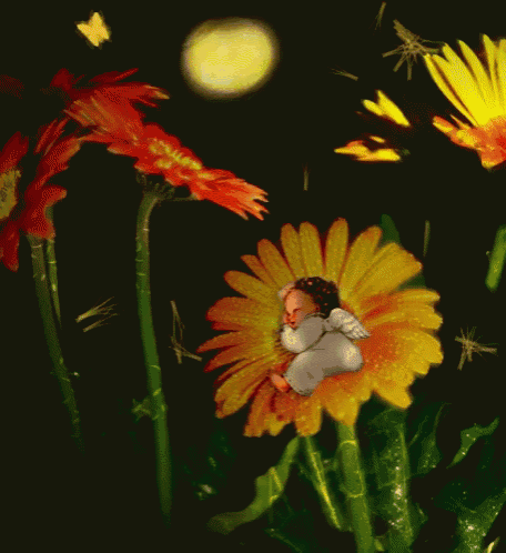 a baby angel is sleeping on a flower