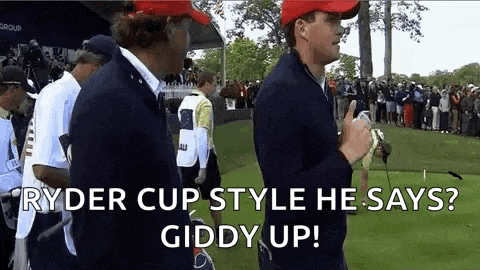 two men are standing next to each other on a golf course and one of them is talking about the ryder cup style he says .