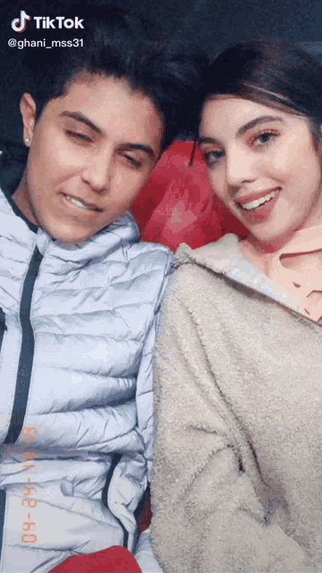 two women posing for a picture with a tiktok watermark on the bottom right