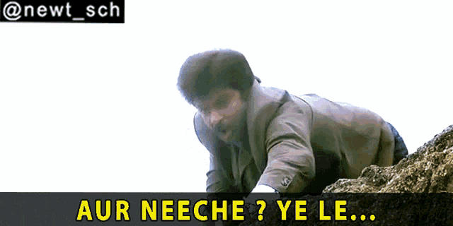 a man is crawling up a rock with the words aur neeche ye le