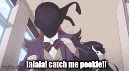 a man in a suit and tie is standing next to a woman in a mask and a cat .