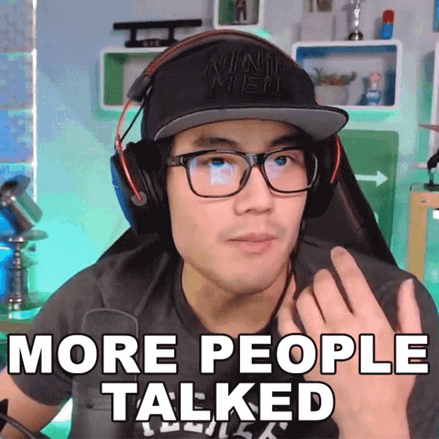 a man wearing headphones and glasses has the words more people talked above his head