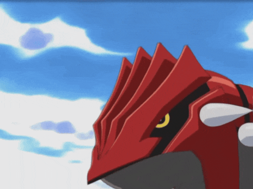 a red monster with a yellow eye is against a blue sky with clouds