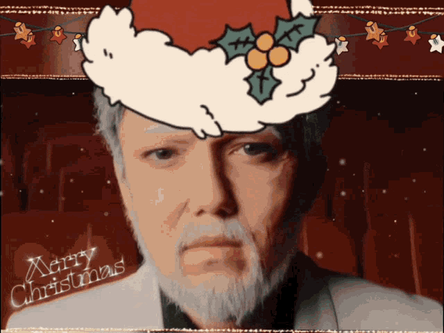 a man with a beard wearing a santa hat with merry christmas written on it