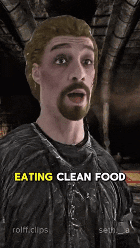 a man with a beard is wearing a black jacket and says eating clean food