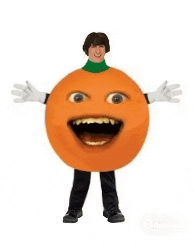 a person in an orange costume with a picture of a man on it .