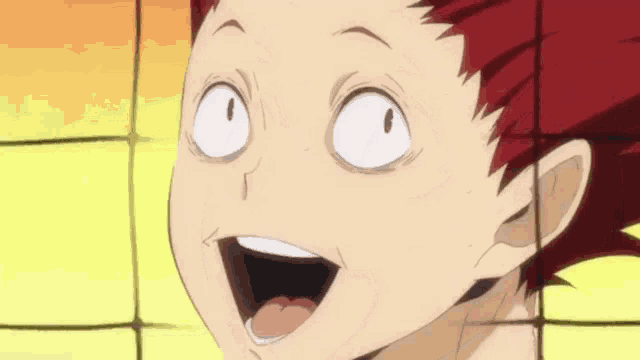a close up of a person 's face with their mouth open and a surprised look on their face .
