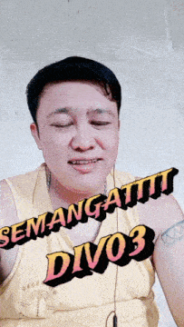 a man with braces on his teeth is wearing a yellow shirt that says semangat div03