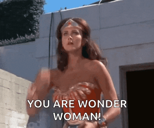 a woman in a wonder woman outfit says you are wonder woman
