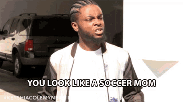 a man in a jacket says " you look like a soccer mom "