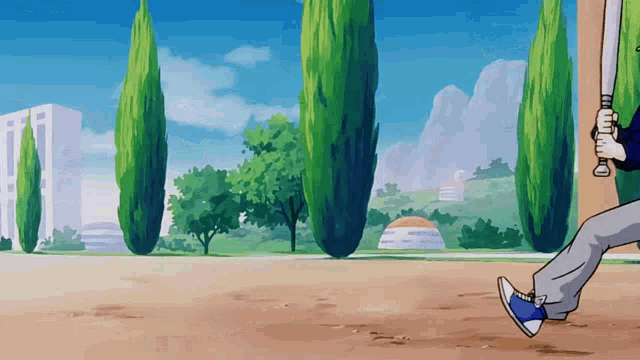 a person holding a baseball bat on a field