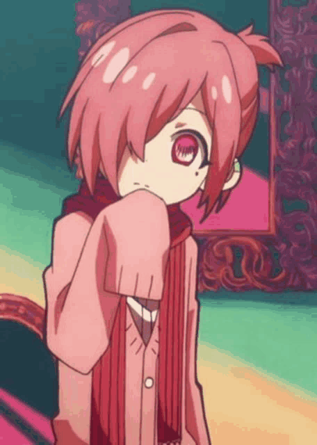 a little girl with pink hair and red eyes is wearing a scarf around her neck and a pink jacket .