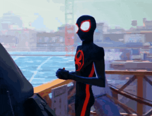 a cartoon character in a black and red spiderman suit stands on a balcony overlooking a city