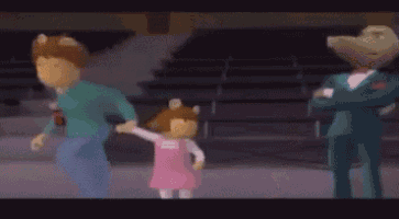 a man and a little girl are holding hands in a stadium .