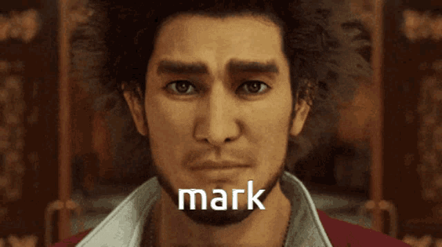 a close up of a man 's face with the word mark on it