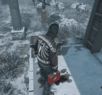 a man in a sweater with the letter x on the back