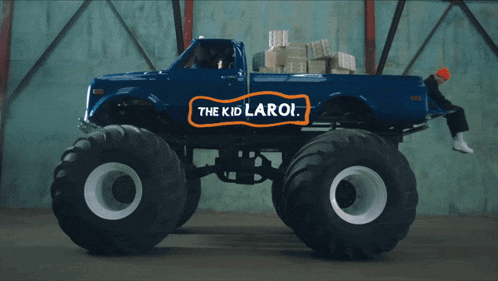 a monster truck with the kid laroi written on it