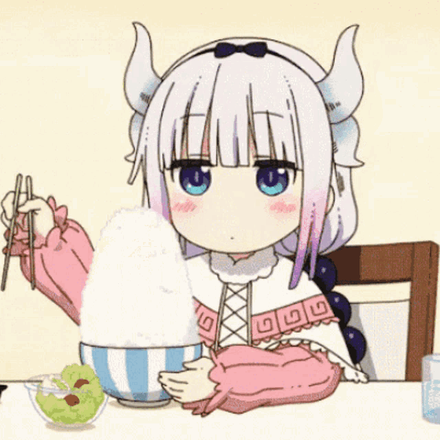 a cartoon girl with horns is eating rice with chopsticks .
