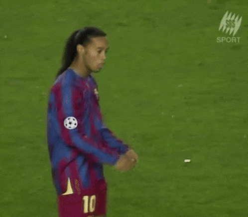 a soccer player with the number 10 on his jersey is running on the field