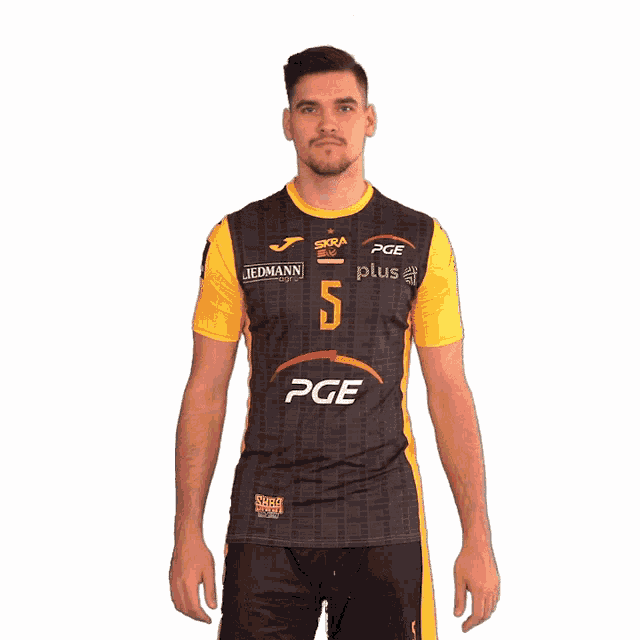 a man wearing a jersey that says pge plus on it