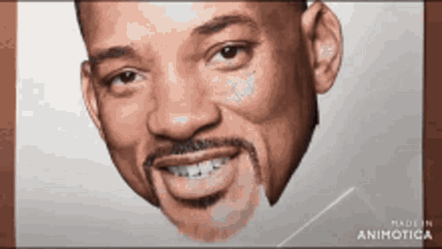 a close up of a man 's face with the words made in animotiga on the bottom right